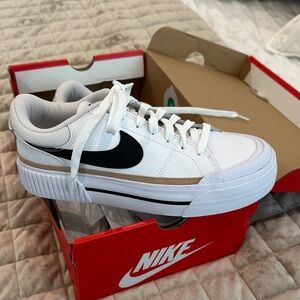 Nike Women’s White Sneakers with Black Swoosh